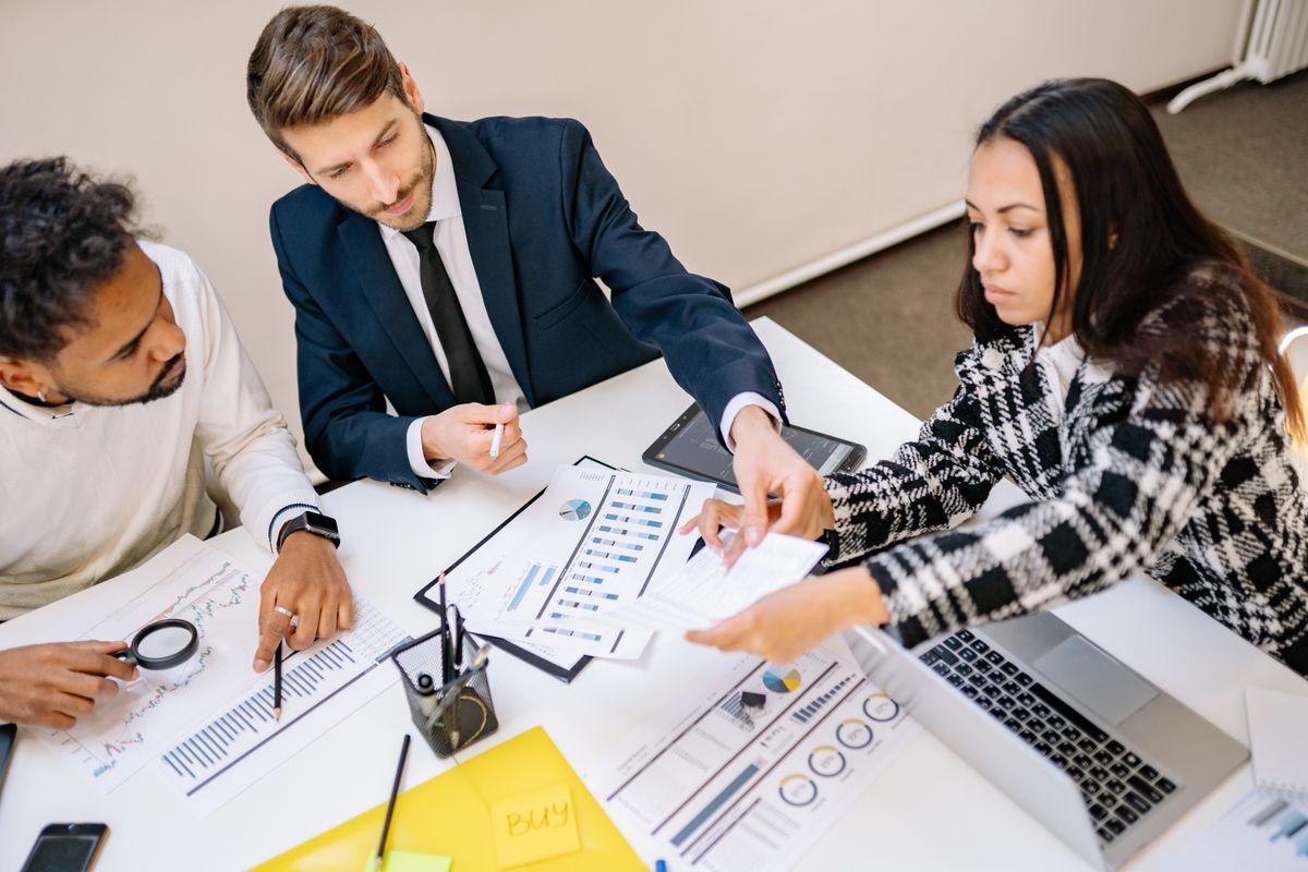 Business meeting evaluating a digital marketing agency proposal