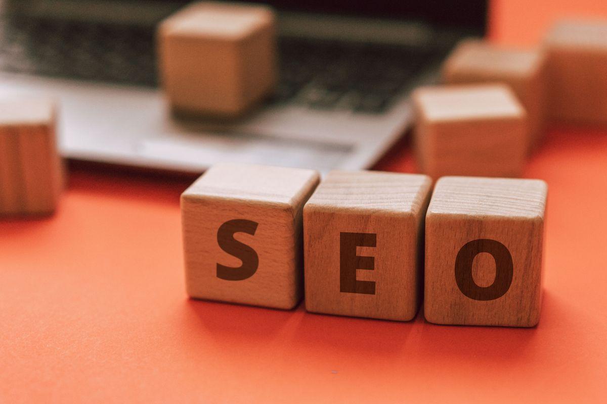 SEO blocks on a laptop keyboard, representing local search optimization