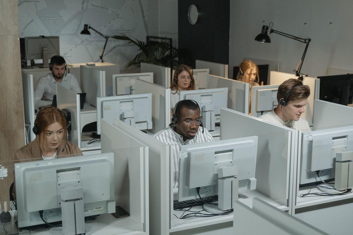 Support team responding to client inquiries