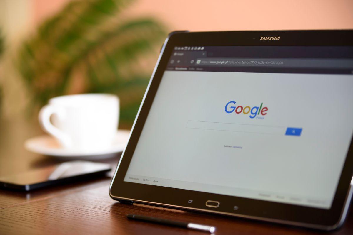 Tablet displaying Google homepage for PPC campaign research